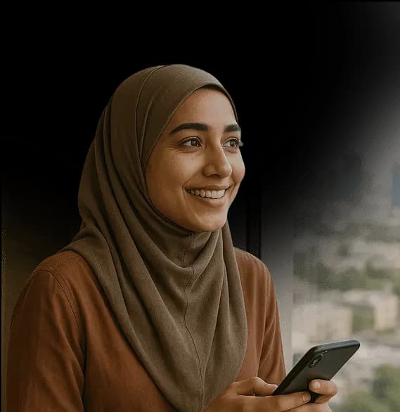 Traveler smiling at her phone